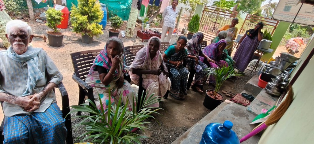 Elderly people sitting together